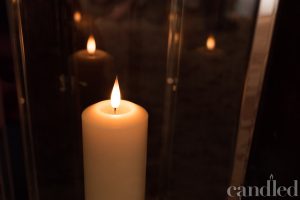 Pillar candle reflection