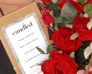 red flowers and candled box